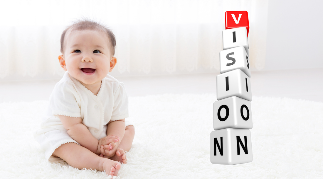 High Contrast Patterns and Baby and Infant Vision, little guy sitting next to black, white and red learning blocks.